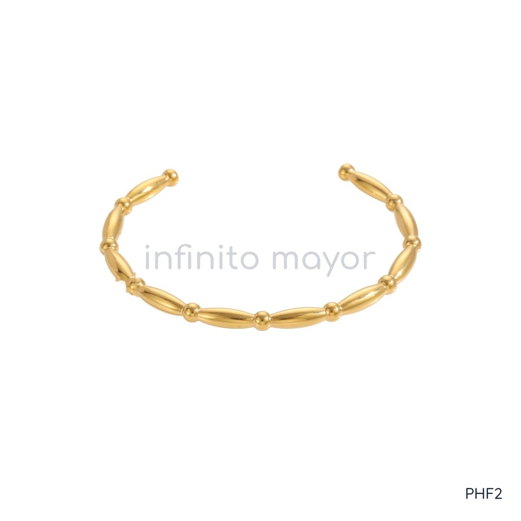 Pulsera dorada rígida, de esferas y barras