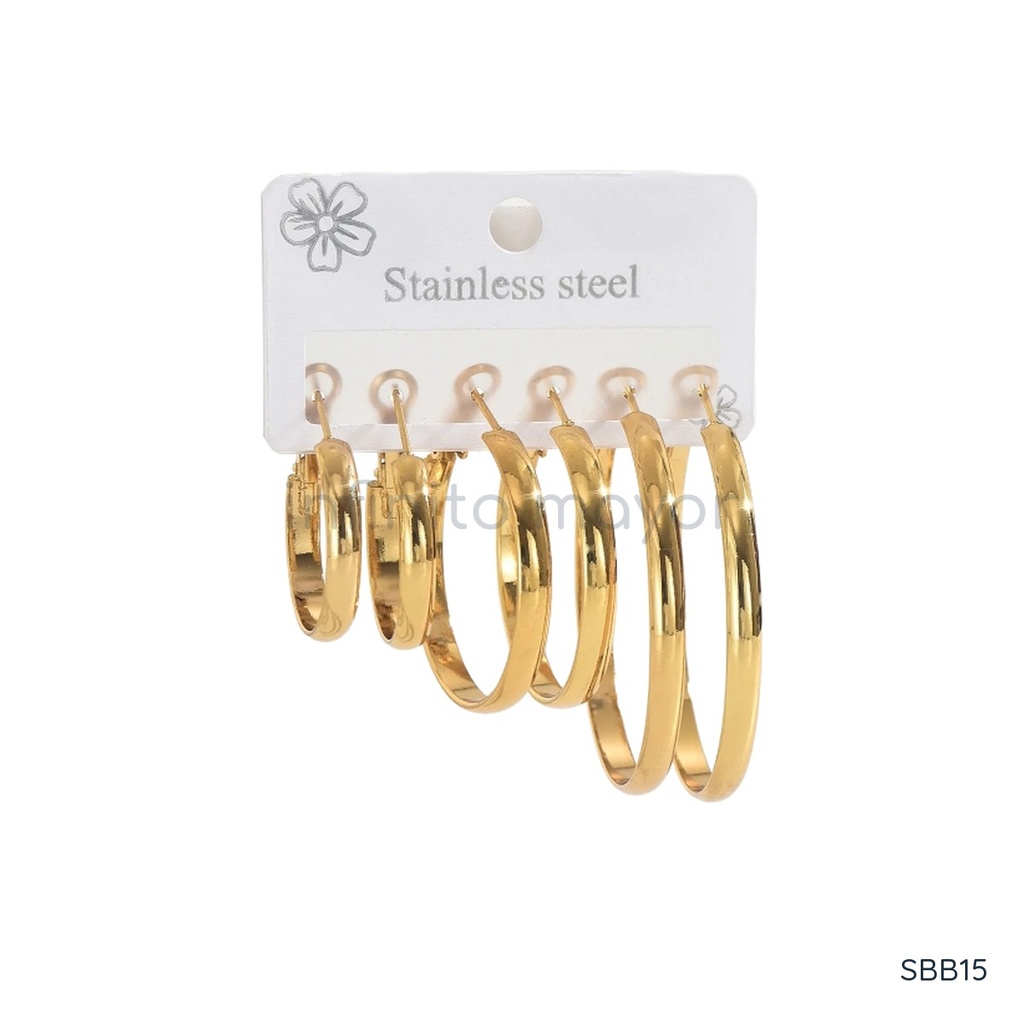 Set de tres pares de zarcillos dorados, aros anchos graduados