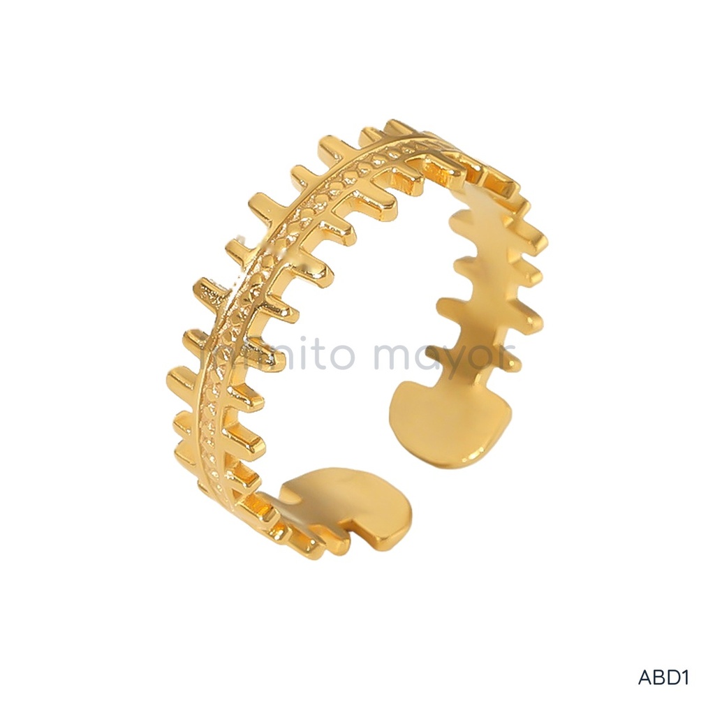 Anillo dorado abierto, banda con bordes dentados