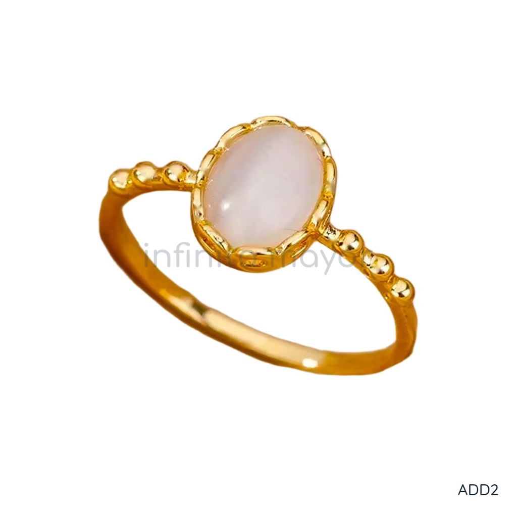 [ADD2] Anillo dorado, banda con piedra central ovalada en tono claro