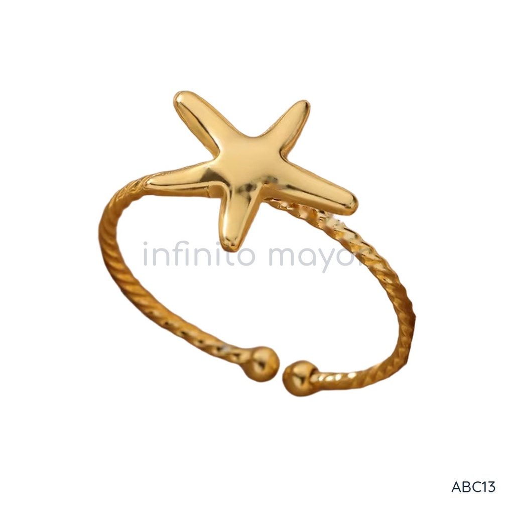 Anillo dorado fino y abierto, diseño de banda trenzada con motivo frontal en forma de estrella de mar