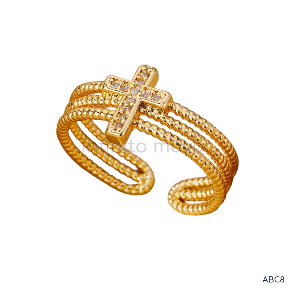 Anillo dorado ancho y abierto, diseño de triple banda trenzada con motivo frontal de cruz de circonias transparentes