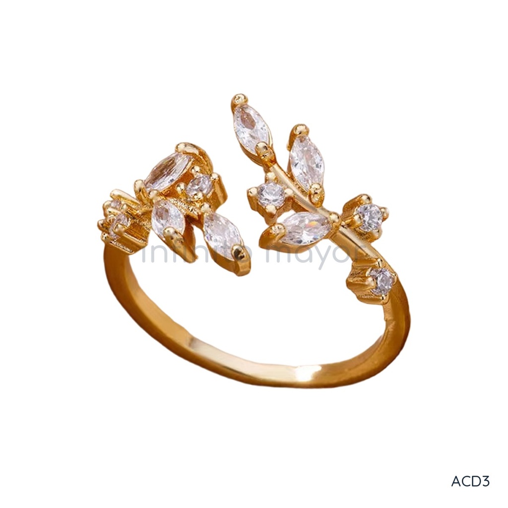 [ACD3] Anillo dorado abierto, rama con hojas de circonias