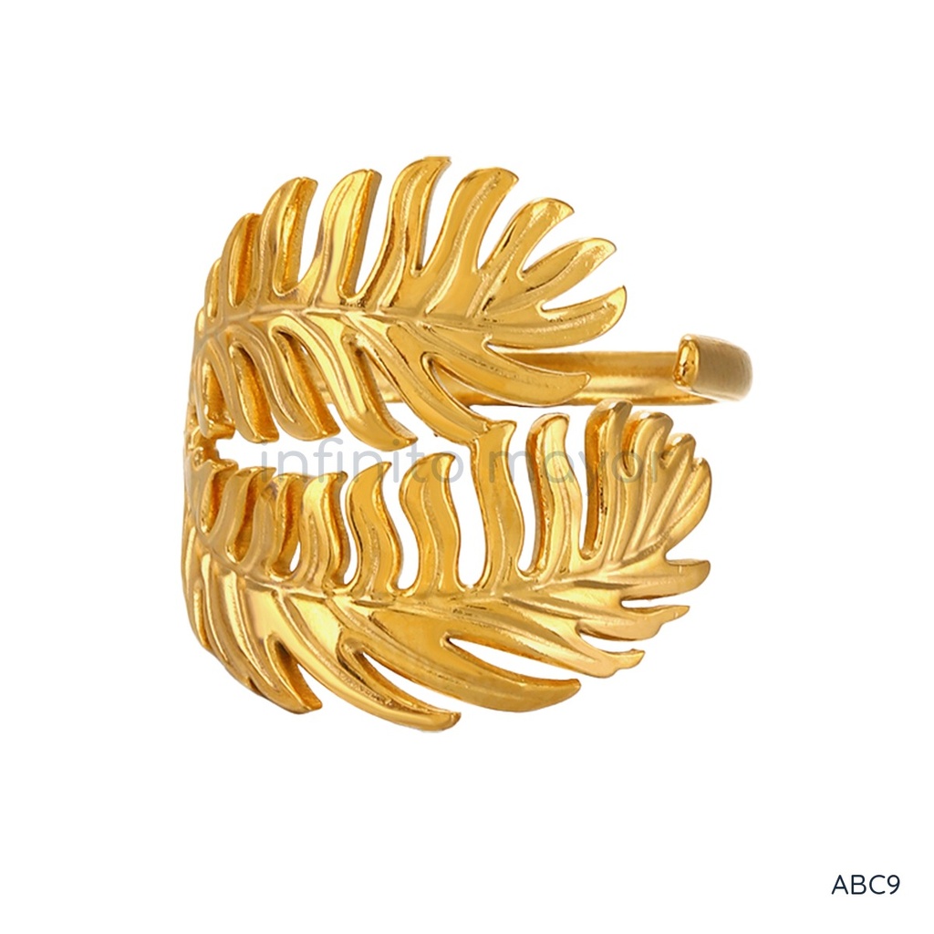 Anillo dorado abierto, dos hojas de palma caladas