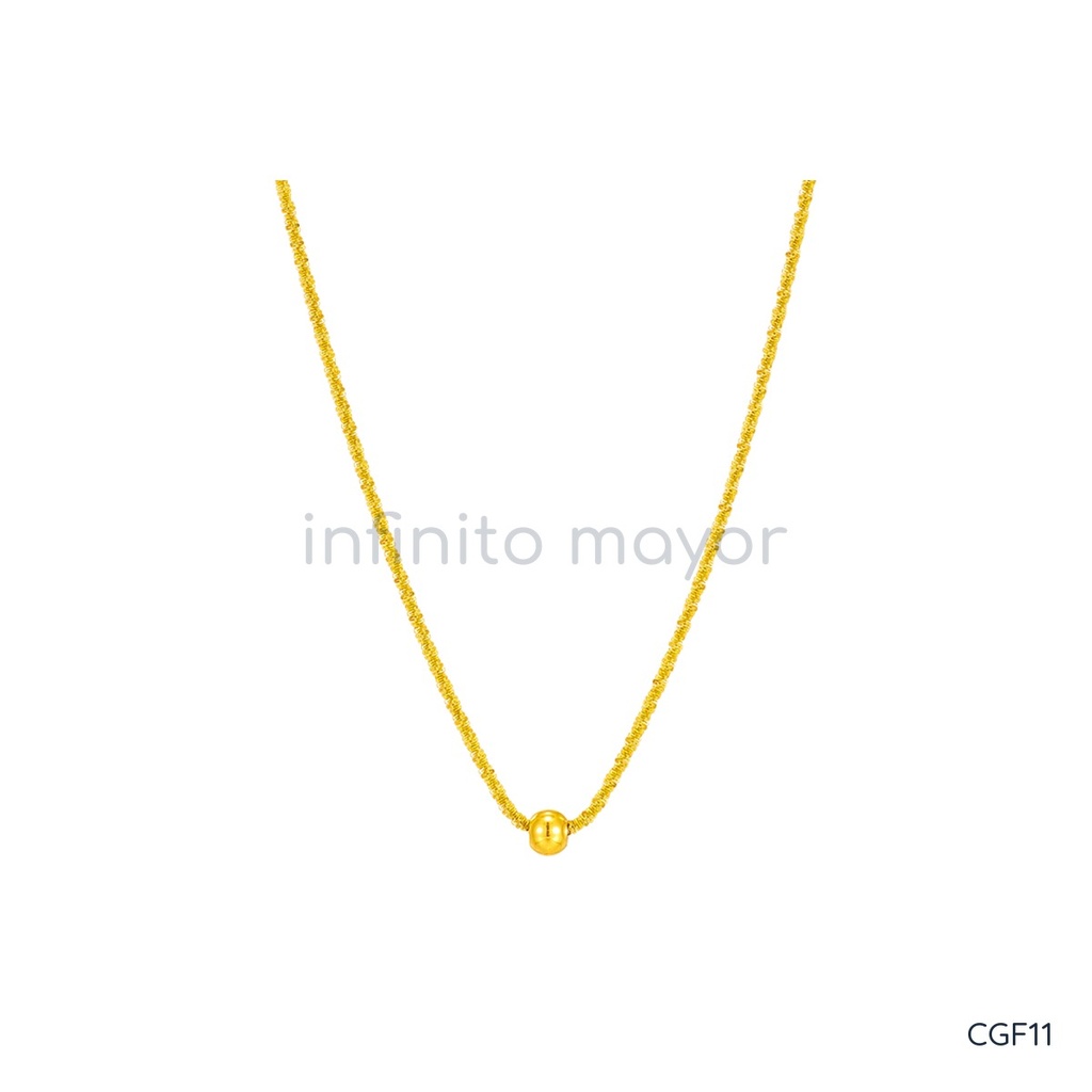 Collar dorado de cadena fina de textura destellante con una pequeña esfera lisa central