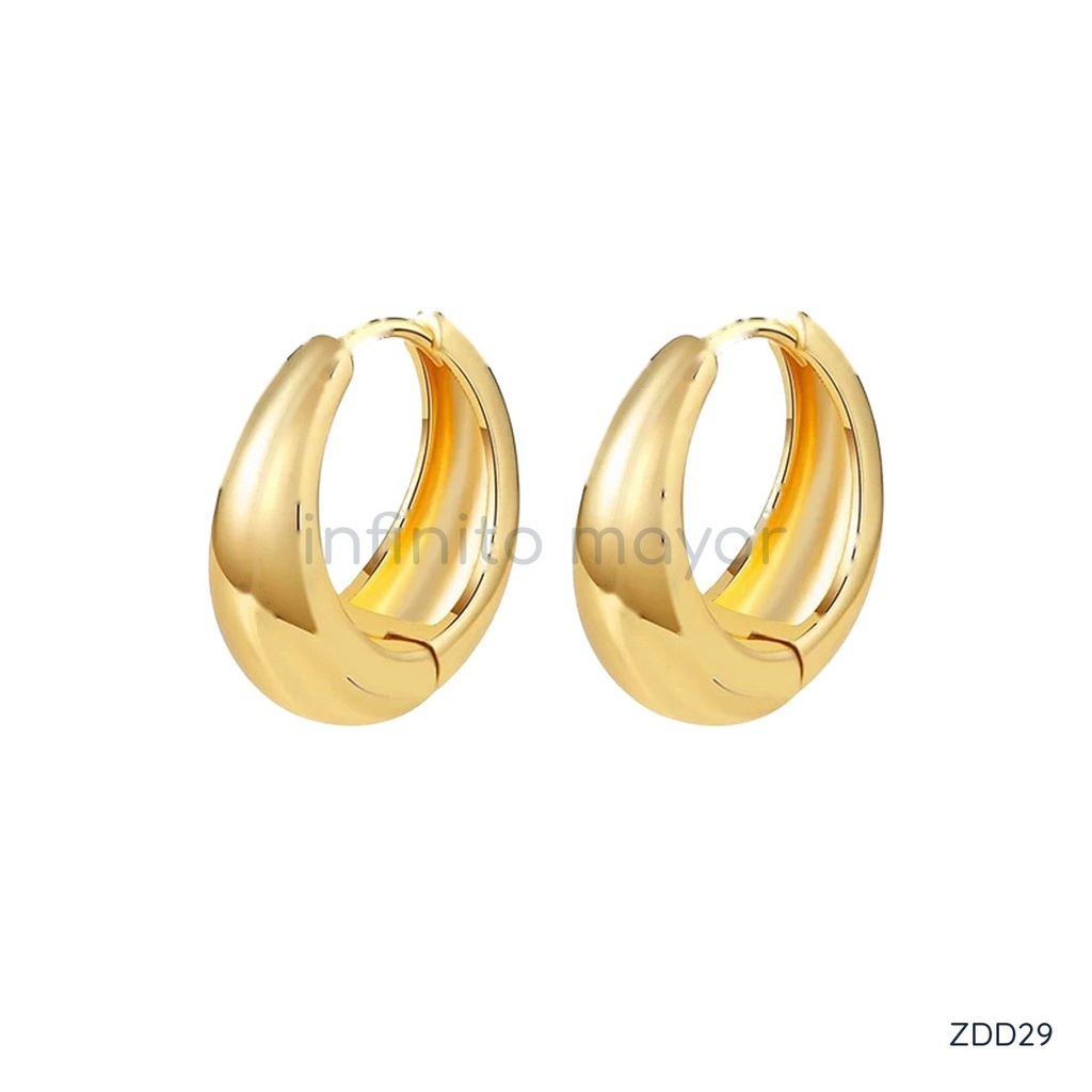 [ZDD29] Zarcillos dorados de argolla huggie ovalada y abombada con acabado liso brillante