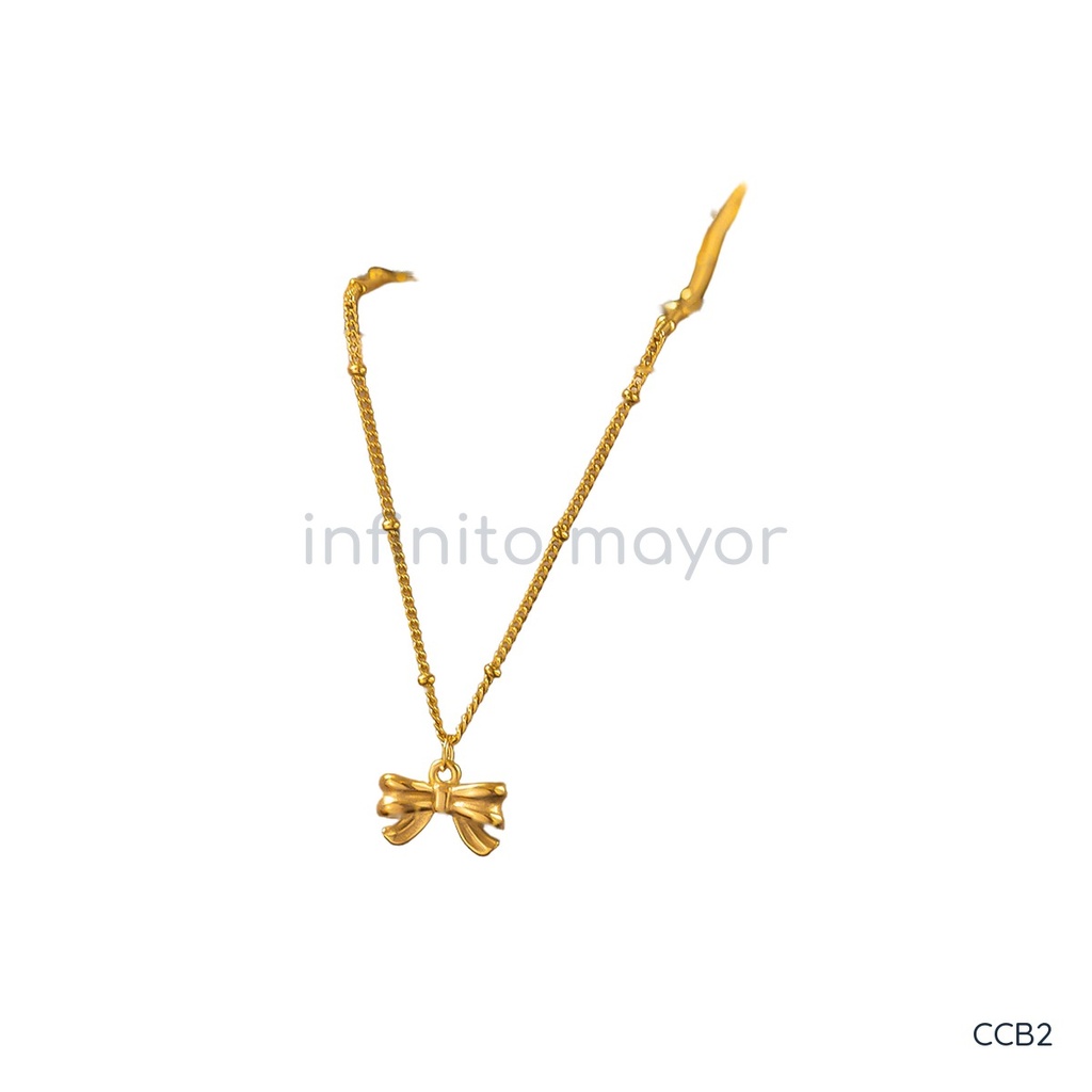 Collar dorado, cadena de cuentas con dije de lazo